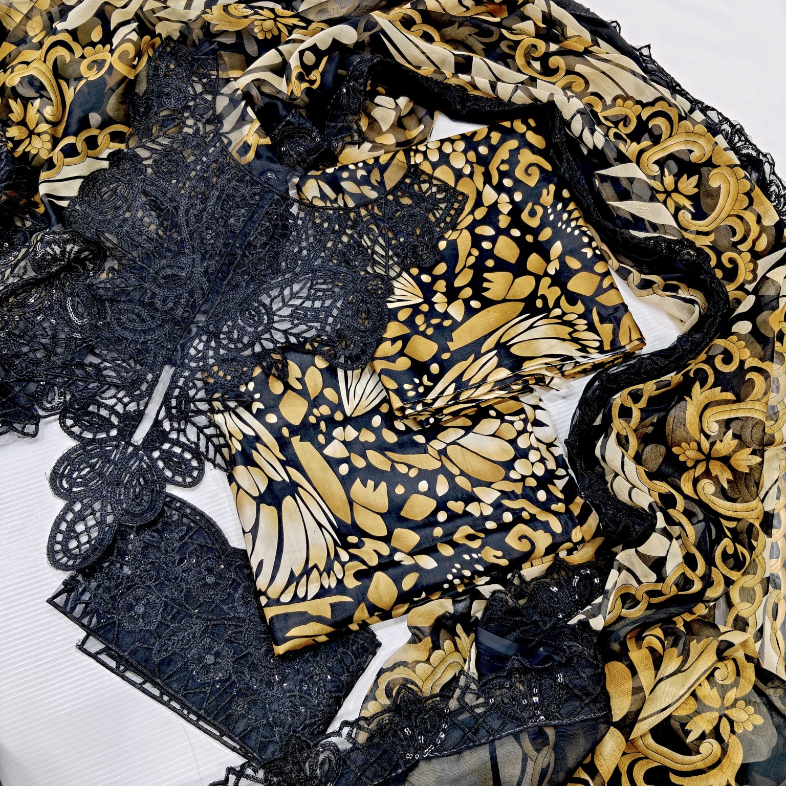 Maria B Printed Embroidered Lawn 3PC Unstitched Suit with Chiffon Dupatta – Black & Mustard 4 Maria B Printed Embroidered Lawn 3PC Unstitched Suit with Chiffon Dupatta – Black & Mustard - Image 4